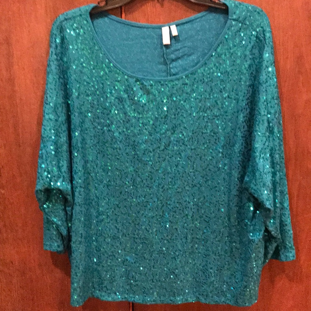 Sequined green top